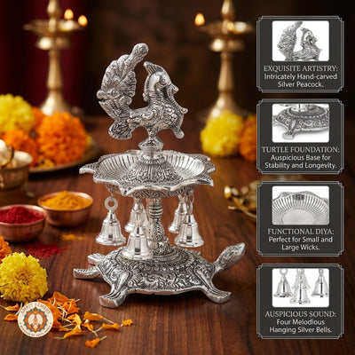 Silver Plated Peacock Diya with Tortoise Pedestal & Bells (25 cm)