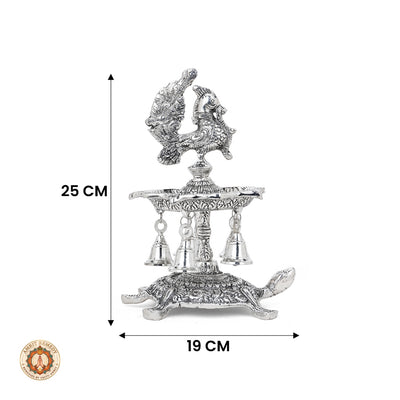 Silver Plated Peacock Diya with Tortoise Pedestal & Bells (25 cm)
